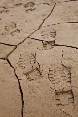 Footprints in Cracked Earth clipart