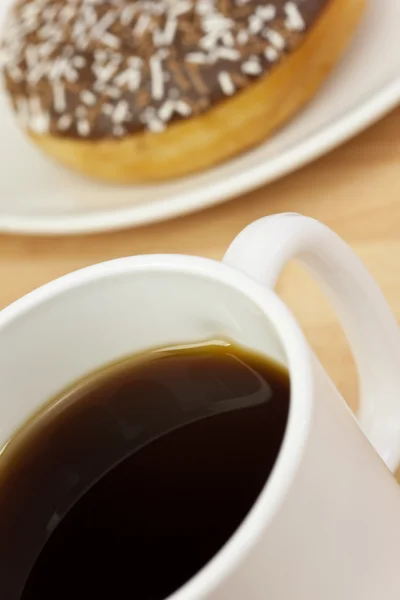 Kaffee und Donut — Stockfoto