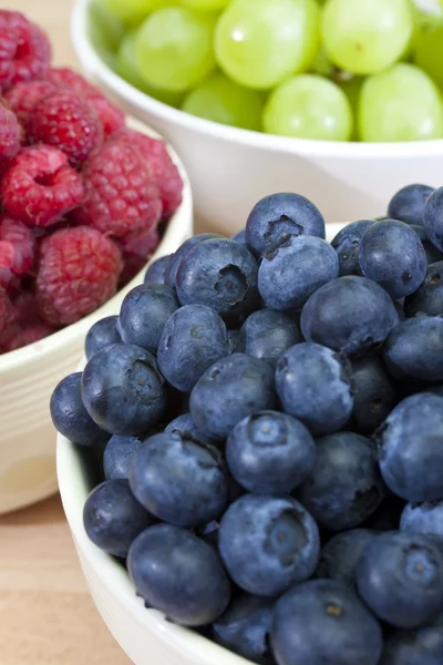 Bowls of Healthy Breakfast Blueberries Raspberries and Grapes — Stock Photo, Image