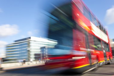 Red London Double Decker Bus Motion Blurred clipart