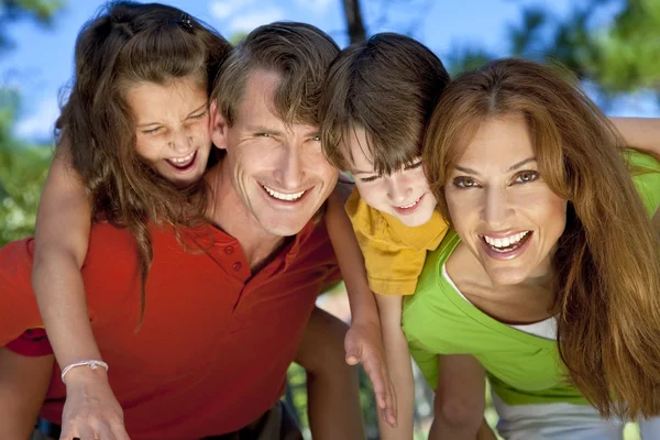Modern Family Having Fun In A Park — Stock Photo, Image