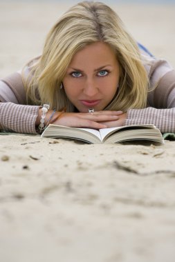 Reading on the Beach clipart