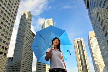 Conceptual picture of Woman with Umbrella clipart