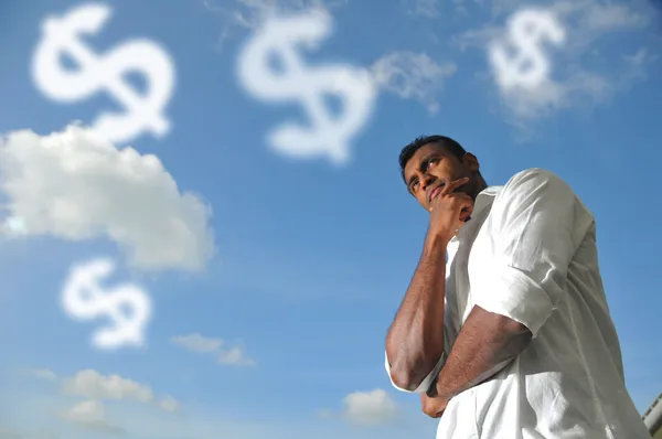Homem indiano pensando em como fazer dinheiro — Fotografia de Stock