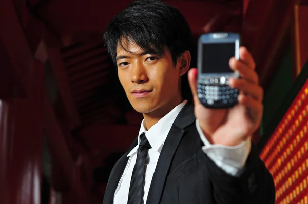 Ázsiai kínai ember mobiltelefon — Stock Fotó