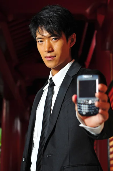 Asian Chinese Man with mobile phone — Stock Photo, Image
