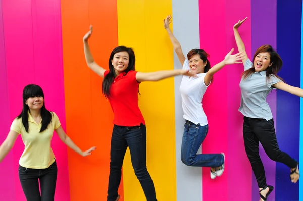Four asian girlfriends in various poses — Stock Photo, Image