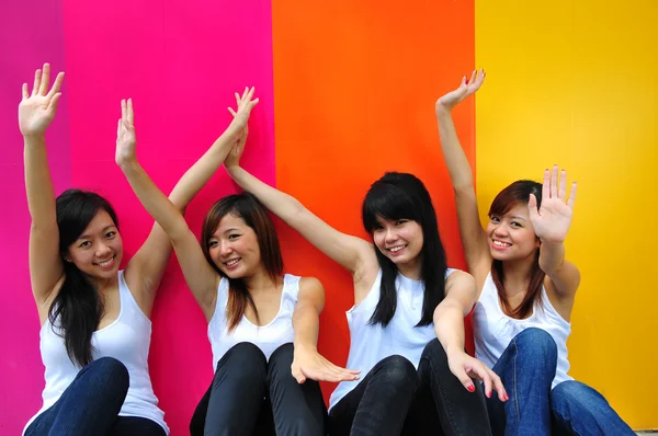 Four asian chinese girls in various poses — Stock Photo, Image