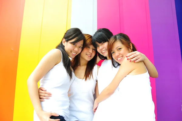 Four chinese asian girls having a great time outdoors — Stock Photo, Image