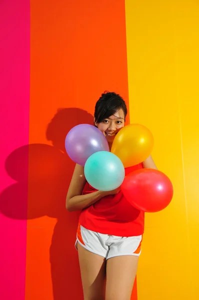Asiatico cinese cheerleader con palloncini — Foto Stock