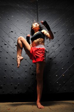 Asian Chinese Thai Girl in various Muay Thai Sports pose clipart