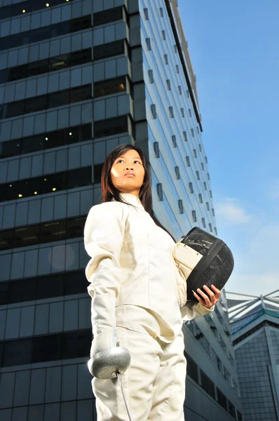 stock image Asian chinese fencer in corporate setting