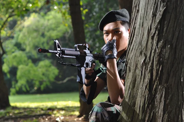 Foto van Aziatische chinese soldaat in verschillende scenario 's — Stockfoto