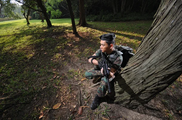 Imagem de soldado chinês asiático em vários cenários — Fotografia de Stock