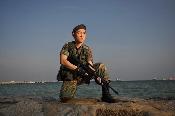 Billede af asiatisk kinesisk soldat i forskellige scenarier - Stock-foto