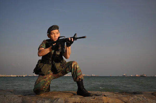 Çeşitli senaryolarda Asyalı Çinli asker fotoğrafı — Stok fotoğraf