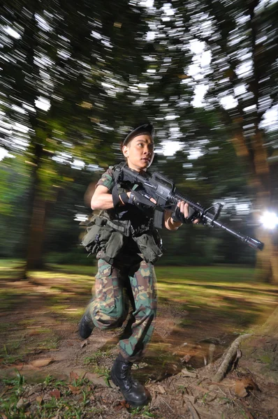 Picture of asian chinese soldier in various scenarios — Stock Photo, Image