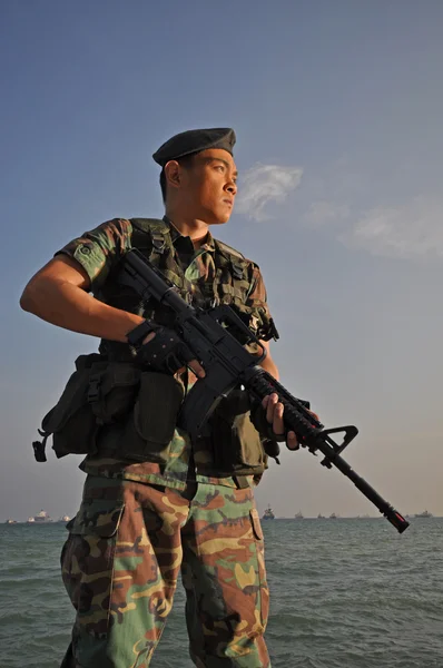 Imagem de soldado chinês asiático em vários cenários — Fotografia de Stock