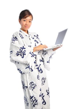 Asian Japanese girl with laptop clipart