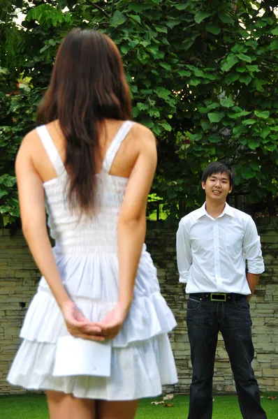 Asian Chinese couple in courtship outdoors — Stock Photo, Image