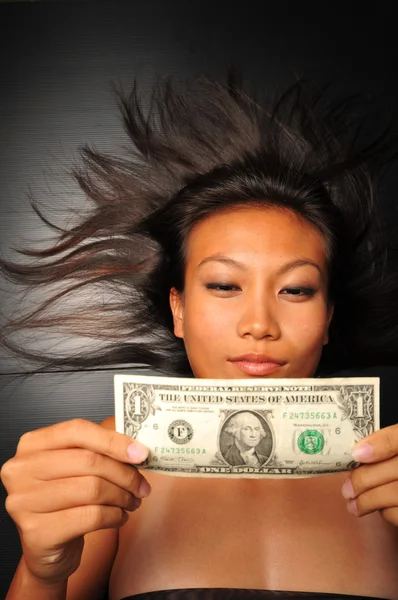 Asian chinese woman with the US Dollar bill Stock Image