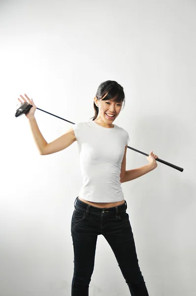 Asijské Číňanka s golf zařízení na bílém pozadí — Stock fotografie