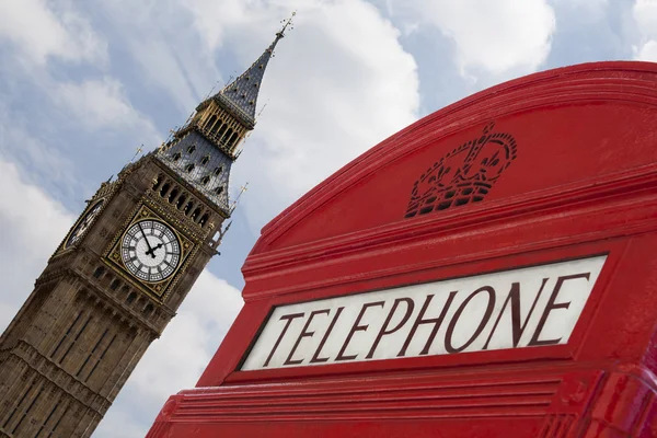 stock image London telephone with Big Ben all focused