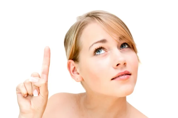 Closeup portrait of a woman pointing away — Stock Photo, Image