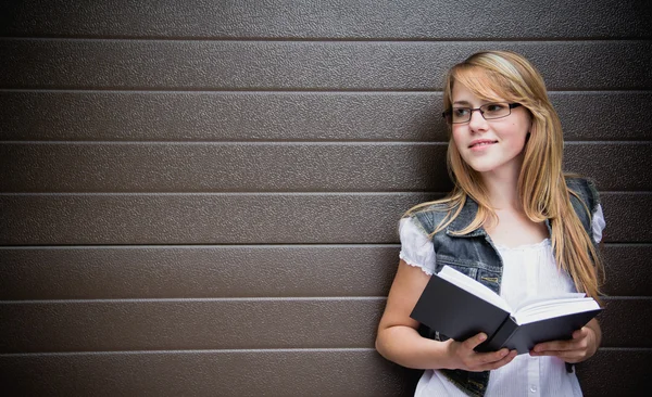 Beautiful girl with a book — Stock Photo, Image