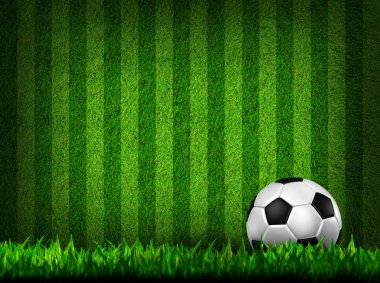 Soccer football on grass field clipart