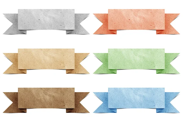 Rúbrica etiqueta de origami papel reciclado artesanía palo sobre fondo blanco —  Fotos de Stock