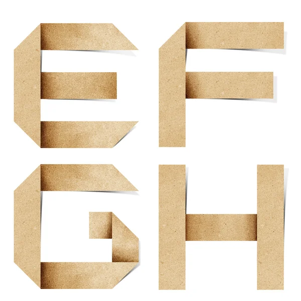 Origami alfabesi harfleri geri dönüştürülmüş kağıt el sanatları sopa beyaz zemin üzerine — Stok fotoğraf