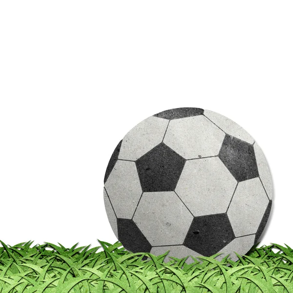 Футбол на переработанной бумаге — стоковое фото