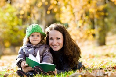 Woman and child having fun clipart