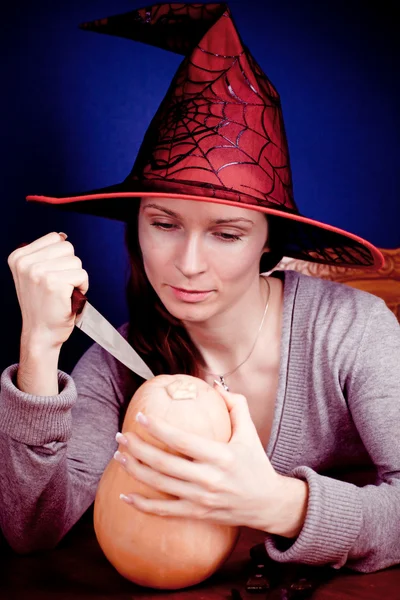 Cute witch with pumpkin — Stock Photo, Image