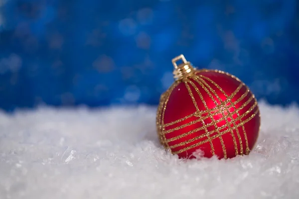 Christmas ball in snow — Stock Photo, Image
