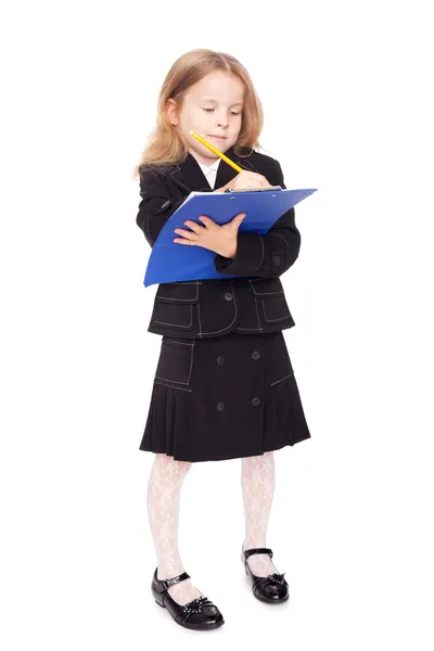 Jolie petite fille en uniforme scolaire — Photo