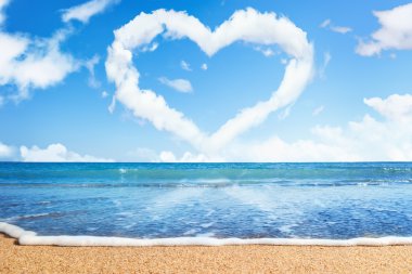 Beach and sea. Heart of clouds on sky. Symbol of love clipart