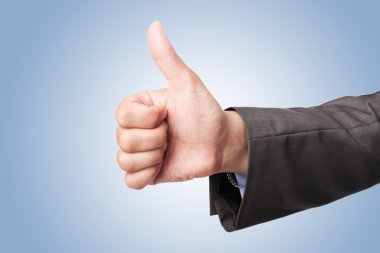 Businessman hand make thumbs up clipart