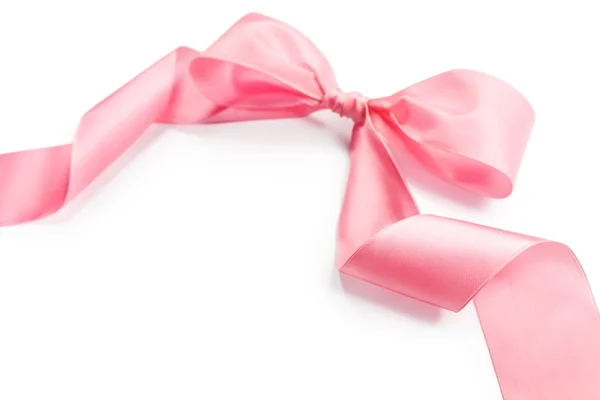 Shiny pink satin holiday ribbon and bow — Stock Photo, Image