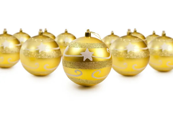Golden christmas decoration balls on white background with copy — Stockfoto