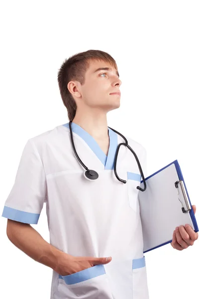 Den unge läkaren med ett stetoskop och en Urklipp i en profil — Stockfoto