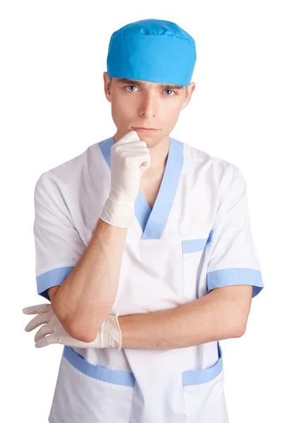 Ο νέος γιατρός σοβαρή ιατρική στα γάντια που απομονώνονται σε λευκό bac — Φωτογραφία Αρχείου