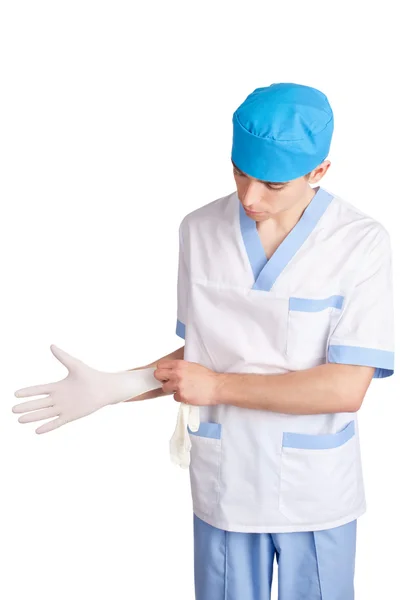 Arzt kleidet Handschuhe isoliert auf weißem Hintergrund — Stockfoto