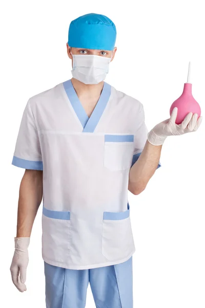Médico com um enema em mãos isoladas em backgrou branco — Fotografia de Stock
