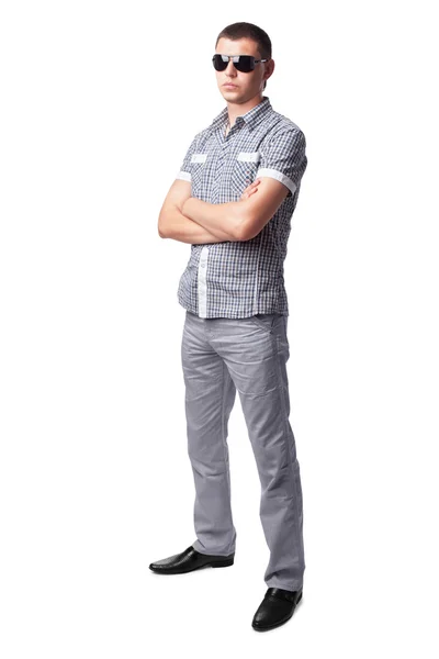 Ernstige jonge man in zonnebril geïsoleerd op een witte achtergrond. Fu — Stockfoto