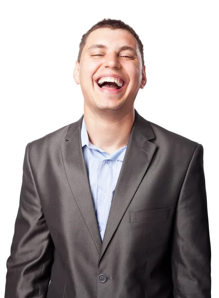 Смеющийся счастливый молодой бизнесмен изолирован на белом фоне — стоковое фото