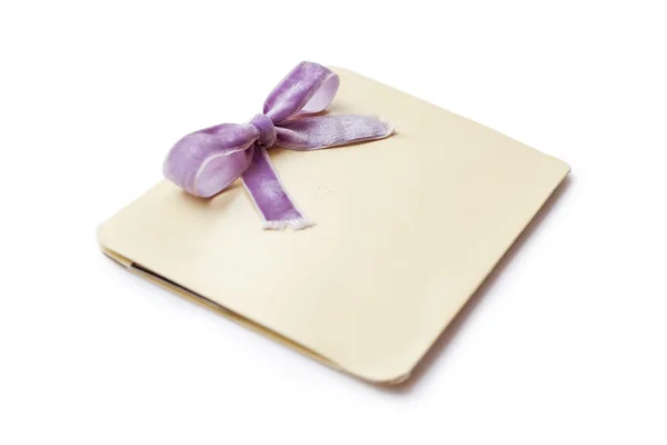 Vintage card with lilac bow isolated on white background — Stock Photo, Image