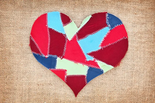 Stofffetzen Herz auf Textur Grunge Hintergrund. Valentinstag — Stockfoto
