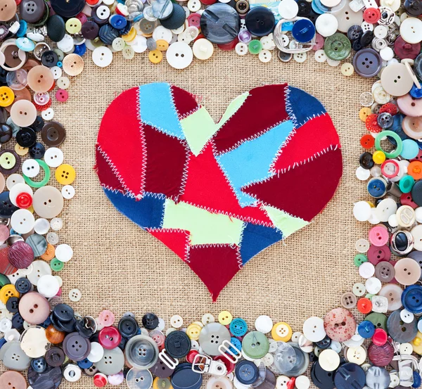Fabric scraps heart on texture background. Valentine's Day. Butt — Stock Photo, Image